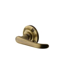Antique Brass Windsor Door Handle on Round Rose