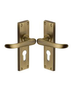 Heritage Brass Antique Brass Windsor Door Handle on Plate - Euro Profile