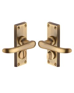 Heritage Brass Antique Brass Windsor Short Door Handle on Plate - Bathroom Set