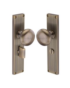 Heritage Brass Antique Brass Victoria Door Knob on Reeded Plate - Bathroom Set