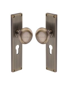 Heritage Brass Antique Brass Victoria Door Knob on Reeded Plate - Euro Profile Set