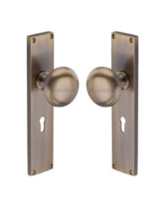 Heritage Brass Antique Brass Victoria Door Knob on Plate - Lock Set