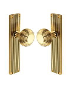 Heritage Brass Polished Brass Beehive Door Knob on Reeded Plate - Latch Set
