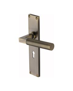 Heritage Brass Antique Brass Bauhaus Knurled Door Handle on Plate - Lever Lock