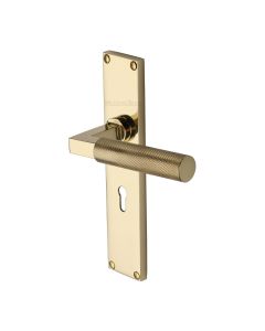 Heritage Brass Polished Brass Bauhaus Knurled Door Handle on Plate - Lever Lock