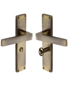 Heritage Brass Antique Brass Delta Hammered Door Handle on Plate - Bathroom Set