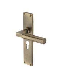 Heritage Brass Antique Brass Bauhaus Hammered Door Handle on Plate - Euro Profile